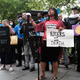 Family members, activists and others hold a rally outside of City Hall to demand that the administration of Mayor Eric Adams do more to address the crisis in living conditions at the Rikers Island Jail on June 23, 2022 in New York City.